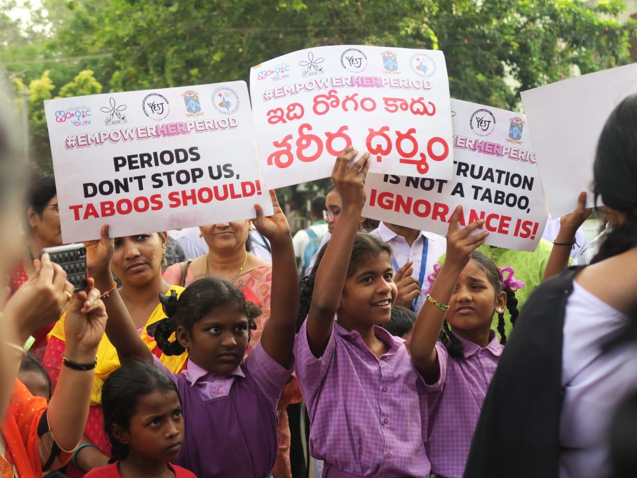 Young students raising awareness about menstruation taboos with AICUF